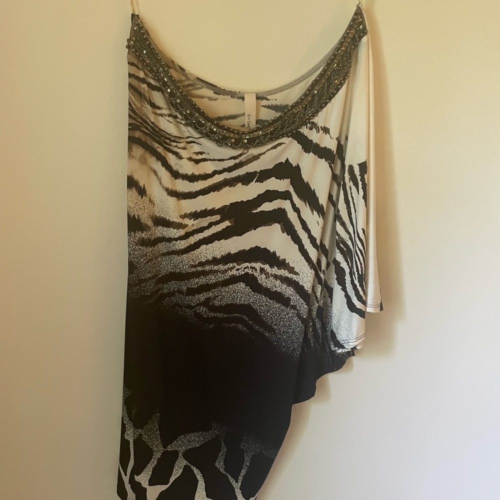 S Twelve Large one wing sleeve dress.